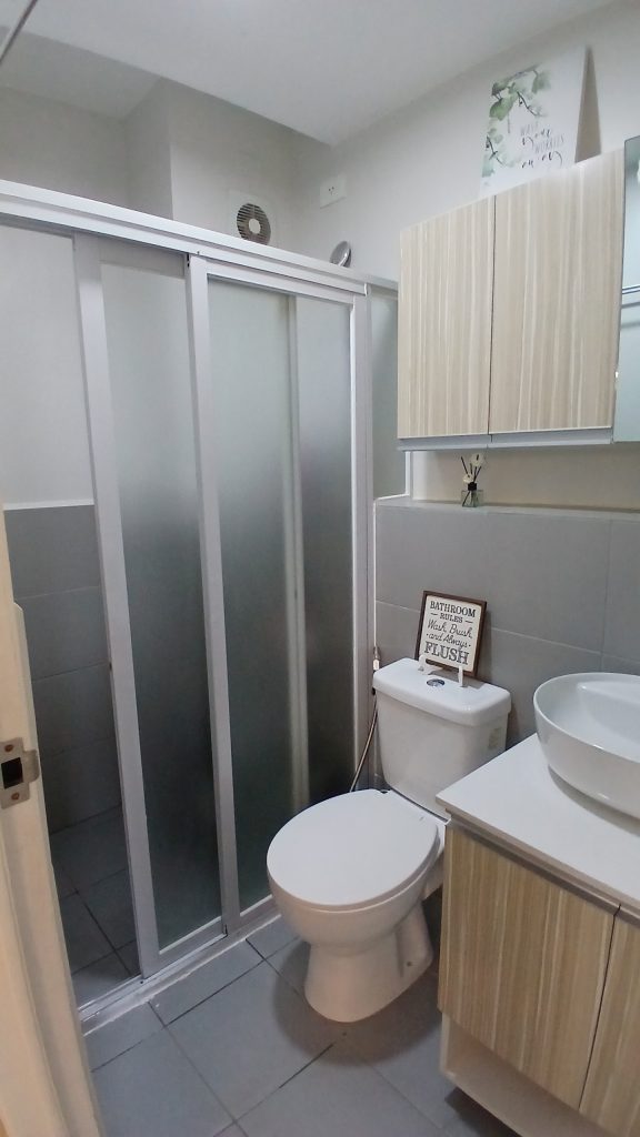 tourist urban abode toilet and bathroom tall 02